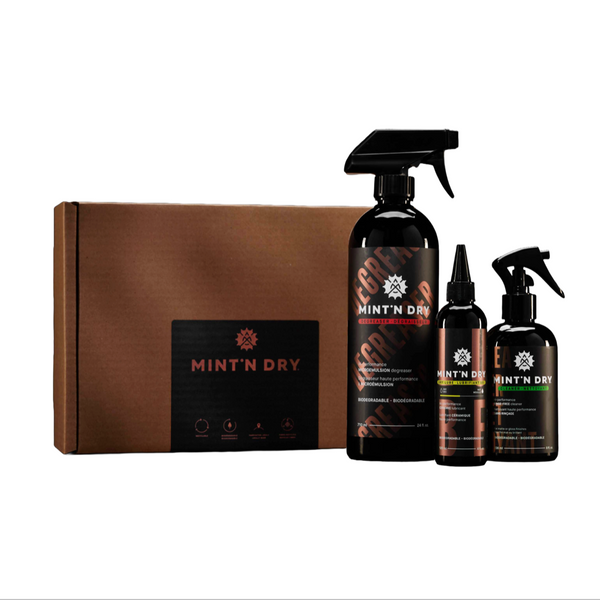 Mint'n Dry bike care product set with bottles and a box on a white background