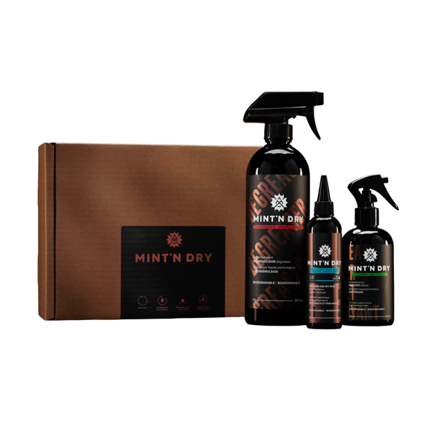 Mint'n Dry bike cleaning products including a degreaser, a cleaner, and smaller bottle of ceramic lube.